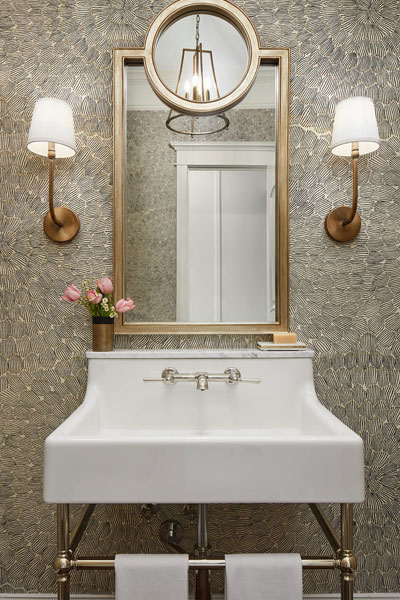 Centered by Design - Spring inspired powder room - White bathroom sink with faucet, and two wall sconvce lights