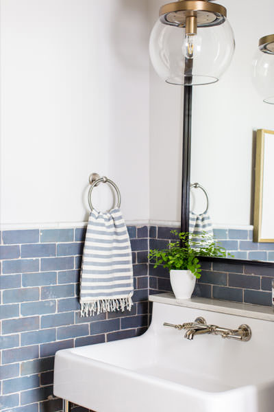 House of Jade Interiors - Winter inspired powder room - Bathroom sink, faucet and towel ring, with light above